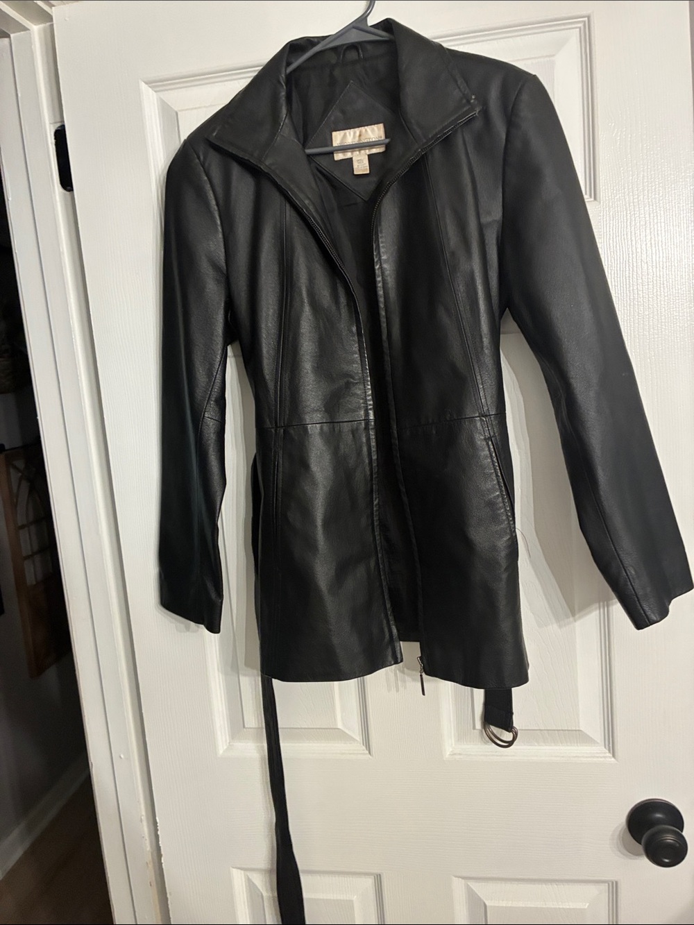 Sleek Black Leather Zip Jacket with Belted Hem